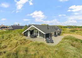 Klassisches Ferienhaus mit überdachter Terrasse und Sauna