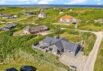 Strandnahes Luxusferienhaus mit Badetonne und Sauna (Bild  1)