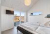 Stilrent og lækkert feriehus med vildmarksbad og sauna tæt på stranden (billede 24)